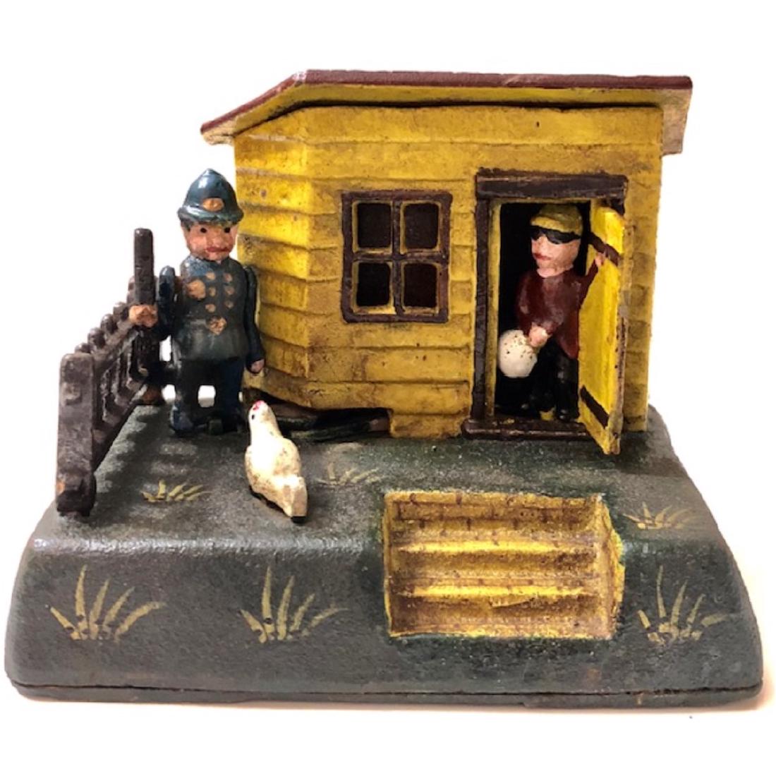 Vintage Cast Iron Cops & Robbers “Uncle Remus Bank” (1 of 4)