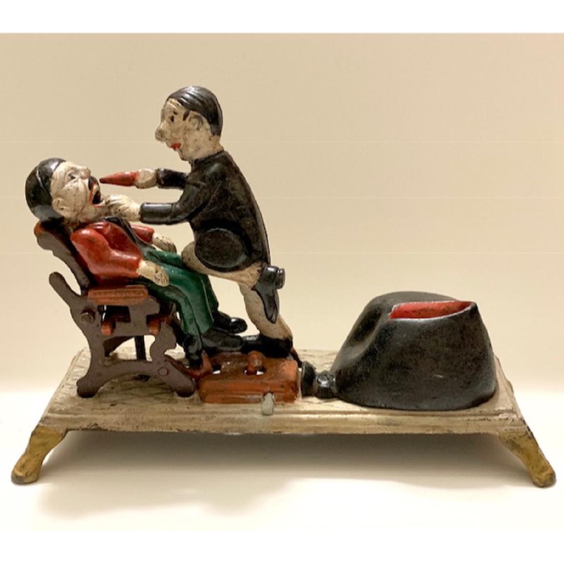 Vintage Cast Iron “The Dentist” Mechanical Coin Bank (1 of 4)