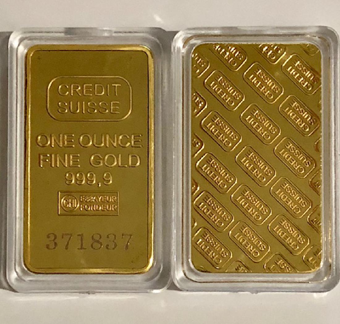 Credit Suisse 1 oz 999.9 Fine Gold Clad Bullion Bar: This is not solid gold. It is gold clad/plated. It is being sold as a collectible novelty item