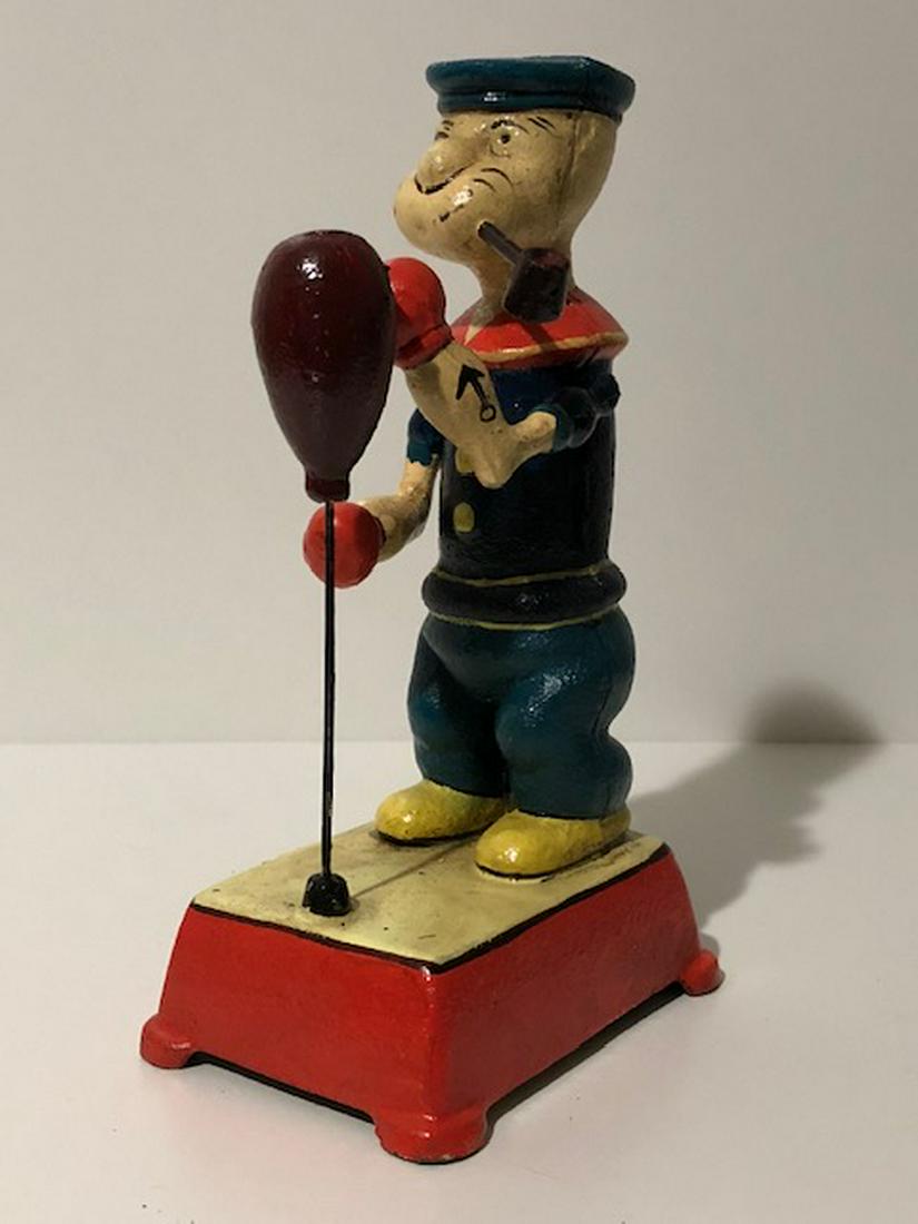 Cast Iron Mechanical Punching Bag POPEYE Toy: 8 inches Tall - Great Piece â€“ Exact Age Unknown â€“ Sold AS-IS - See all Photos