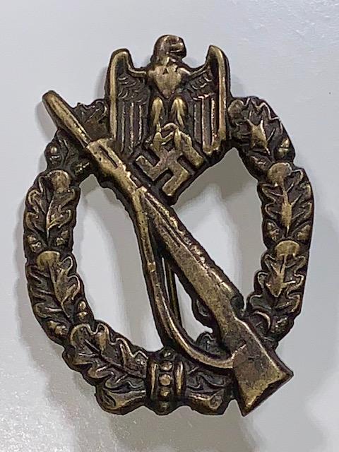 WW2 Nazi German Weapons Expert Uniform Badge Pin: These Items came from a Very High-End Estate But due to the High Cost of getting them checked out the Inherit Owner chose Not to and decided to Sell them with No Reserve AS-IS. We cannot Guarantee whe