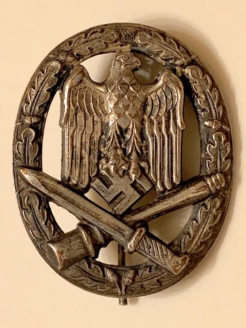 WW2 Nazi German Weapons Expert Uniform Badge Pin: These Items came from a Very High End Estate But due to the High Cost of getting them checked out the Inherit Owner chose Not to and decided to Sell them with No Reserve AS-IS. We cannot Guarantee whe