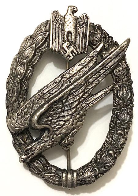 WW2 German Nazi Paratrooper Flying Eagle Uniform Pin: These Items came from a Very High End Estate But due to the High Cost of getting them checked out the Inherit Owner chose Not to and decided to Sell them with No Reserve AS-IS. We cannot Guarantee whe