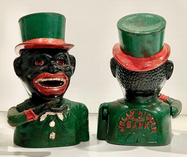 Black Americana Cast Iron JOLLY NEGRO Coin Bank: This Mechanical Coin Bank symbolizes a dark part of our History / We Do Not Share the Same Opinion this Piece may Represent / We do not know how old these actually are / See all Photos