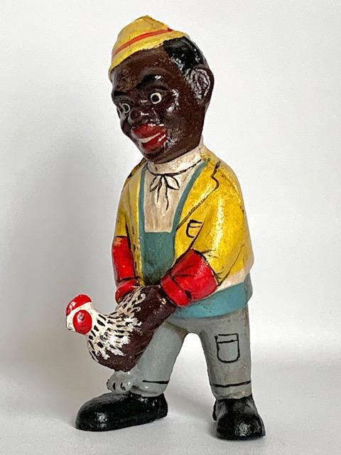 Black Americana Cast Iron Chicken Catcher Coin Bank: We are Not certain when these were made therefore Sold AS-IS with Regards to Age / We Do Not Support any of the Ideals this Piece Represents / Multiple Photos Posted