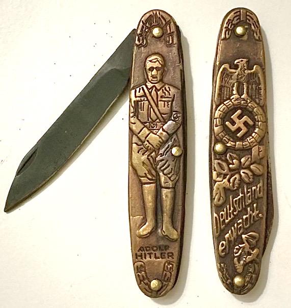 Nazi Germany Adolf Hitler Embossed Pocket Knife: Ornate Double Sided Imagery - We cannot Guarantee whether it is Period or Authentic therefore Selling AS-IS - We have provided Highly Detailed Photos so Please do your Own Research before Bidding