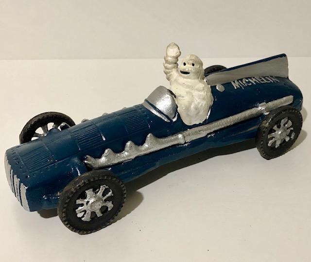 Vintage Cast Iron Toy Michelin Man Driving Race Car: Large - 11” Long - Great Piece