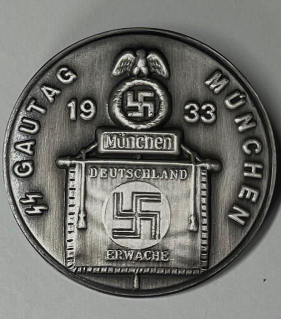 WW2 Nazi German SS Gautag Munchen Tinnie Badge Pin: Multiple Photos Posted - This item came from an Estate Sale Liquidation / The Previous Owners Claimed they were Surplus items but We do not know for sure therefore they are being Sold as Reproductions