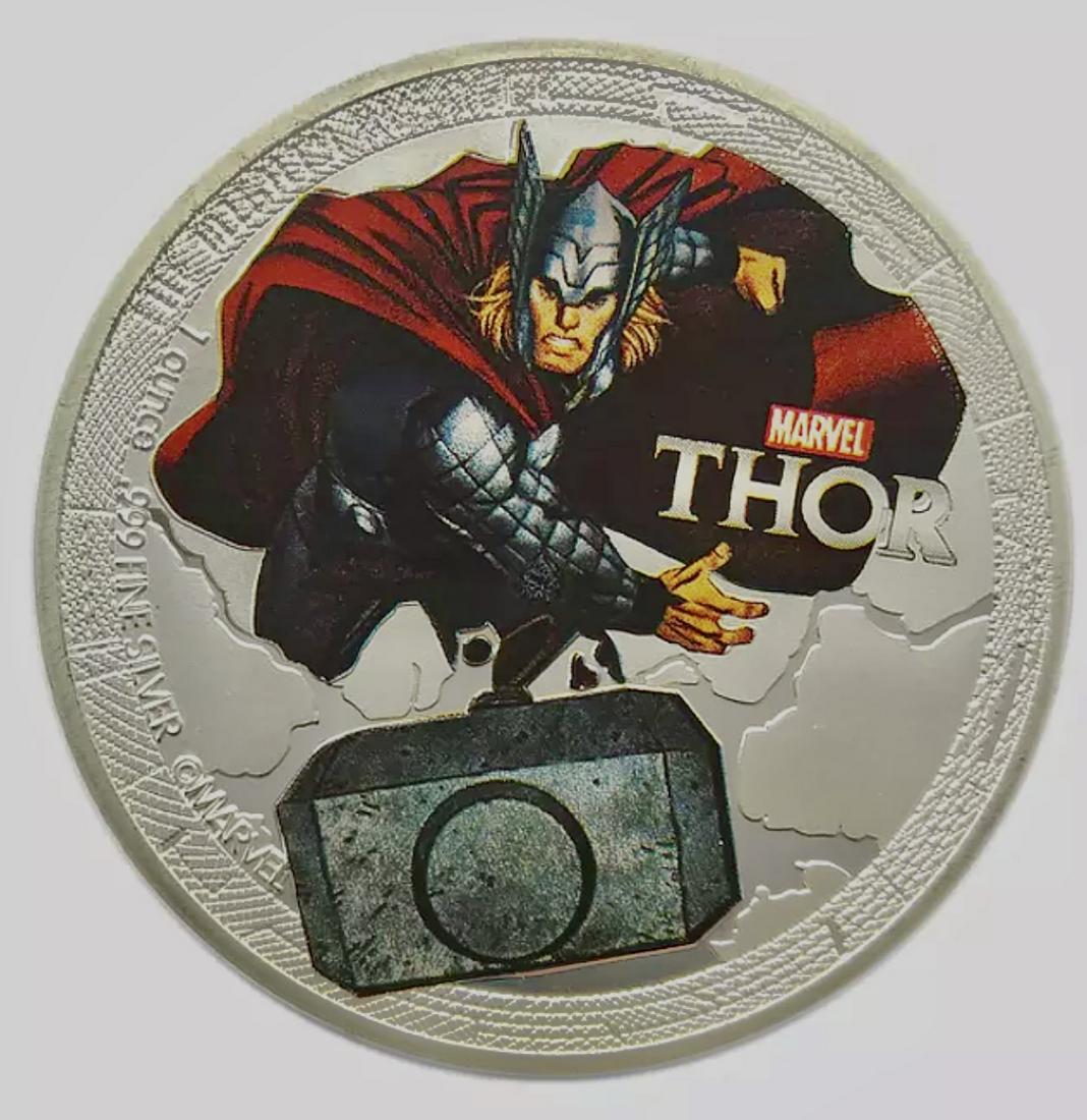 Marvel Comics The Avengers THOR 1oz Clad Silver Coin: Marvel Comics THE AVENGERS - Encapsulated - These are Novelty Collector Items and Do Not Carry any Precious Metal Value â€“ They are Plated/Clad Silver Coins