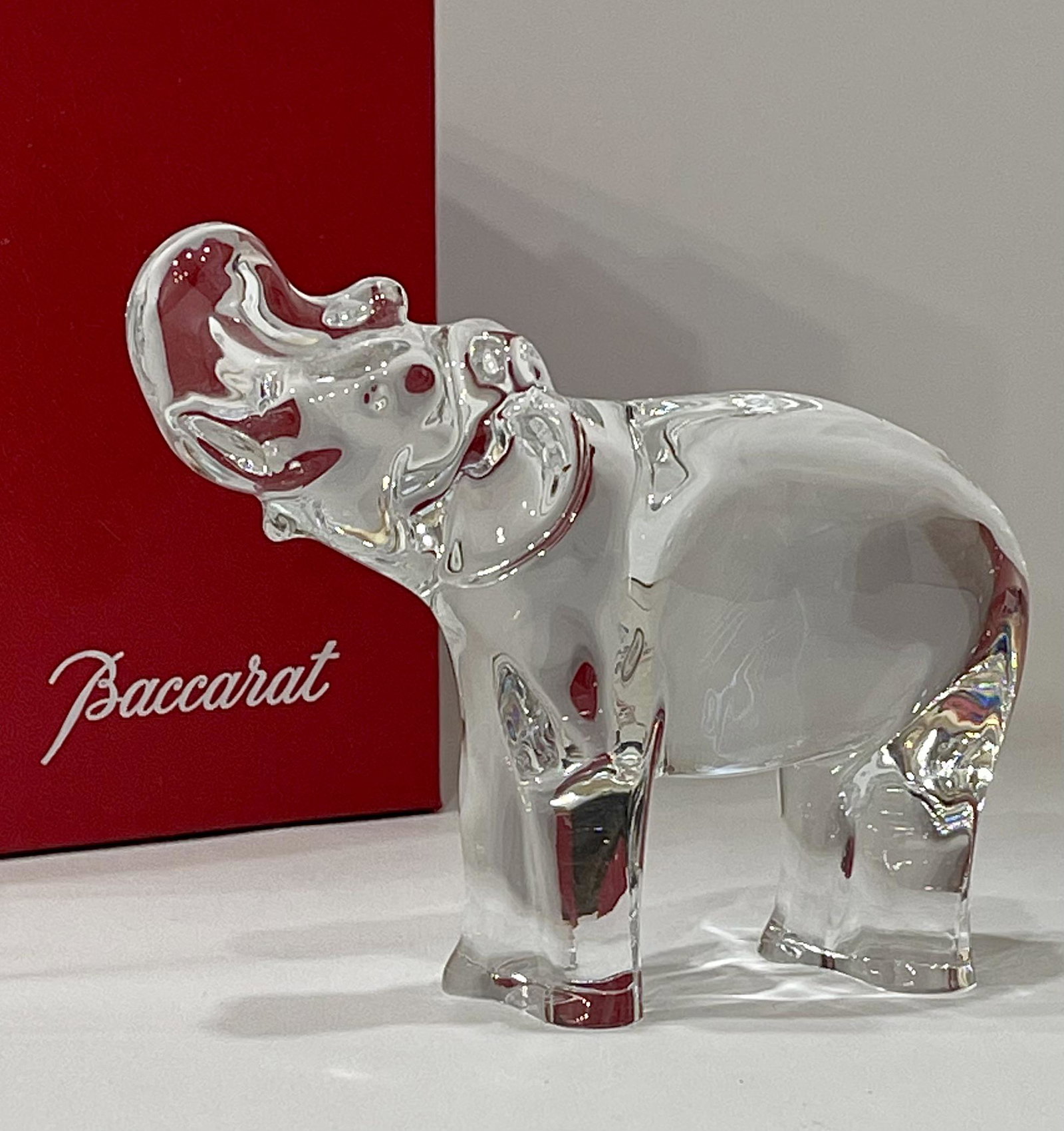 Retired BACCARAT France Crystal ELEPHANT Statue: Beautiful Piece of Baccarat Crystal in Excellent Condition â€“ Please Note the Box in the Photos is definitely not the original box it came in and was only used for Enhancing the Item in the Phot
