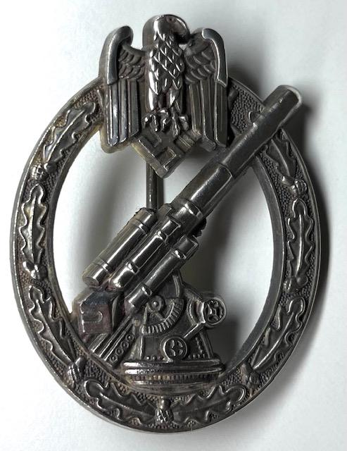 WW2 Germany Nazi Weapons Expert Uniform Pin: Multiple Photos Posted / This Piece is not a WW2 Used Piece / It is either a Surplus Item or a Reproduction â€“ Sold AS-IS