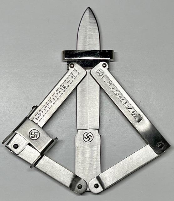 WW2 German Nazi Paratroopers Folding Pocket Knife: Ornate â€“ Multiple Photos Posted - This Knife is a Reproduction and Sold AS-IS - All WW2 Nazi, German or Russian Advertised Items are SOLD AS-IS. We Cannot be Certain whether or Not these are Su