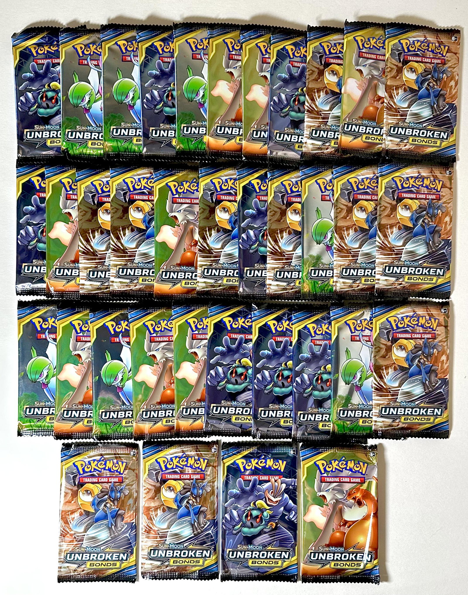 Lot of 36 POKEMON Sun and Moon Unbroken Bonds Sealed Packs of Trading Cards (1 of 2)