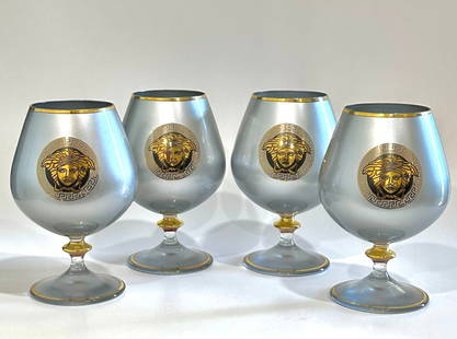 Lot of 4 Versace Medusa Crystal Brandy Goblets with Pear Platinum Inlay: These are Vintage Never Used Not Marked Versace Brandy Glasses with a Pearl Platinum Finish. They are Not signed but from the research we did, we noticed that many of the items Versace put out was not