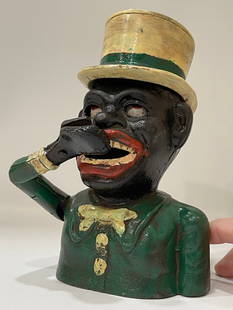 Black Americana Cast Iron JOLLY NEGRO Mechanical Bank: This Mechanical Coin Bank symbolizes a dark part of our History / We Do Not Share the Same Opinion this Piece may Represent / We do not know how old this is but it is NOT a Period Original Piece / See