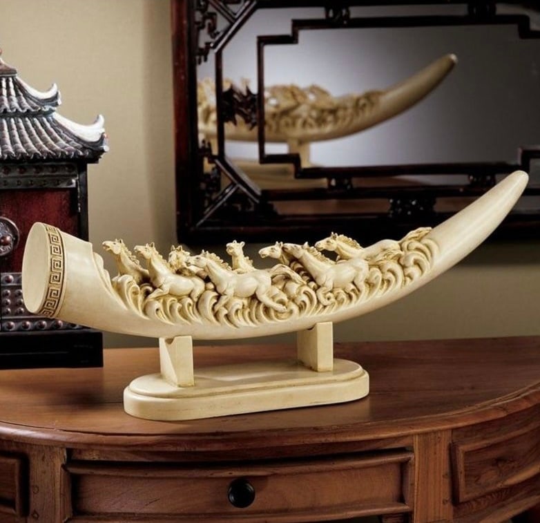 Ornate Galloping Horses Sculptural Oliphant Mandarin Faux Ivory Tusk: Approximately 22 inches long by 8 inches tall. Awesome looking piece. Ornately carved. Made from Mandaring faux ivory. It has never been on Display. This was Consigned to us by a Store that was suppos