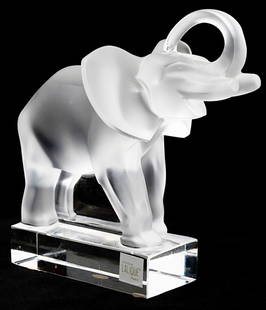 Large LALIQUE France Frosted Crystal Trunk Up Elephant Sculpture: This Elephant by Lalique is in Beautiful Condition and weighs approximately 2-3 pounds and is nearly 7-8 Inches Tall. PLEASE NOTE THAT THE STICKER WAS PEELING BACK AT TIME OF TAKING PHOYOS SO WE TOOK