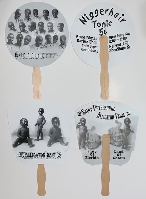 Lot of 2 Black Americana Advertising Fans: These Items are Part of a Hateful History. We Do NOT Condone or share in any of the opinions or implied hatred that these items represent. Multiple Photos Posted. These are also being Sold as Reproduc