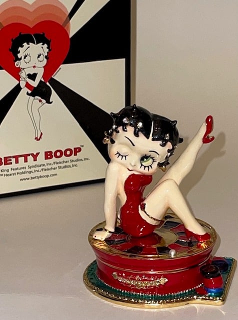 RARE Retired BETTY BOOP Enameled Figurine Trinket Box: This Version is named ROULETTE ANYONE ? - It is a Beautiful Studded and Enameled Hinged Magnetic Trinket Box Figurine of the Iconic Betty Boop - It has never been displayed and Comes with the Original
