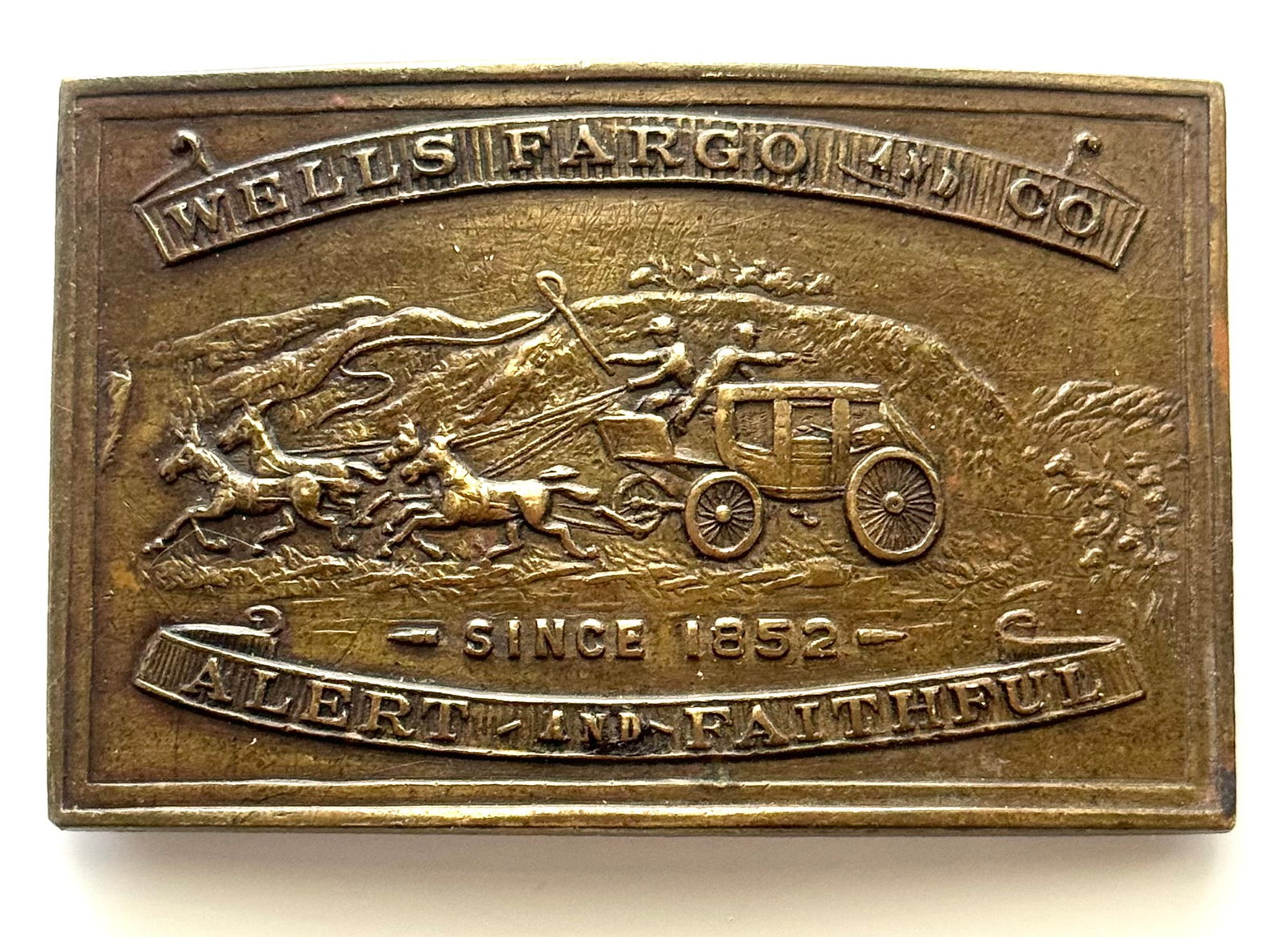 Signed Tiffany and Co Wells Fargo and Co Alert and Faithful Belt Buckle: This is Signed Tiffany and Company, Wells Fargo Alert and Faithful along with E Gaylord and Co. This Belt Buckle. It has Great Natural Patina but We are Not Certain this is an Original therefore it is