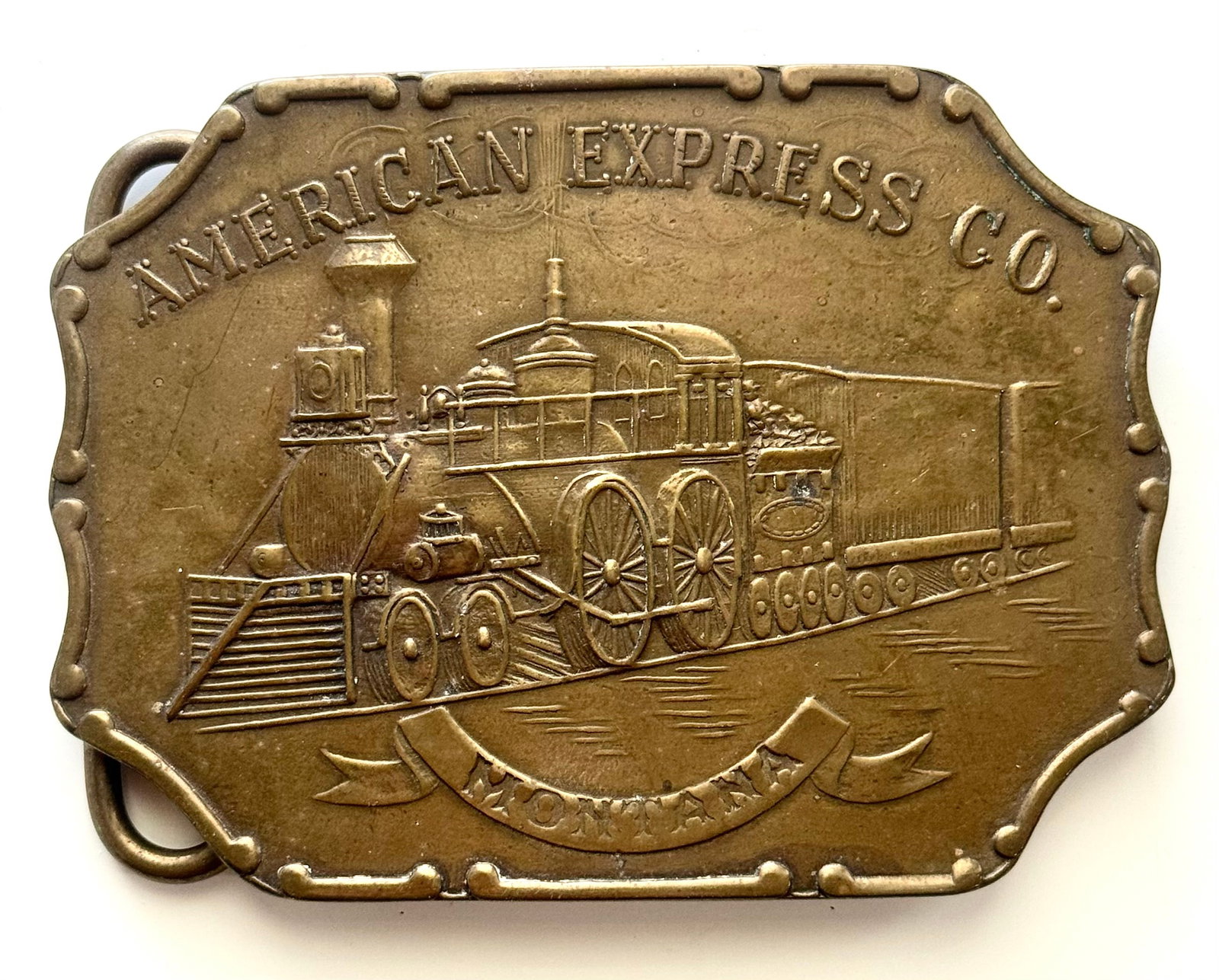 Signed Tiffany and Co American Express Co Montana Brass Belt Buckle: This is Signed Tiffany and Co along with Tiffany Broadway NY. This Belt Buckle. It has Great Natural Patina but We are Not Certain this is an Original therefore it is being Sold to the Highest Bidder 