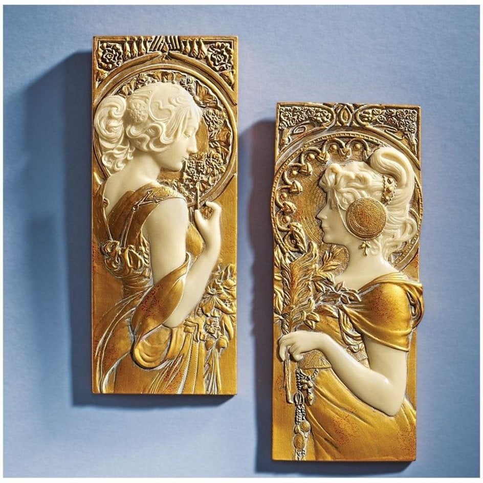 Art Nouveau Wall Décor inspired by Alphonso Mucha: Lot of 2 was originally designed by Artist Alphonse Mucha. It was recast in high quality designer resin, hand painted in hues of Ivory and Gold and are beautiful. They each stand nearly 10 inches tall
