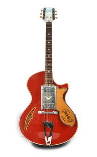 c. 1963 Wandre B.J Major: 1963 Wandre model BJ Major, red with rare gold sparkle trim. This thin hollowbody guitar also features a metal guard with a white Davoli emblem and twin pickups. Notable as well is the rare gold