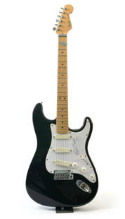 Eric Clapton signed and played Fender Stratocaster: A black 1988 Fender Stratocaster played by Eric Clapton in a session at Syncro Sound recording studio, Boston, on September 15, 1988. Serial #E475727. The consigner of this guitar sang in the