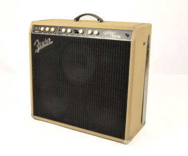 1990 Fender VibroKing Amp: 1990 Fender VibroKing, blonde tolex, in excellent-plus condition. With a whopping three original 10" Jensen speakers and EL84 circuitry, the Fender custom-shop VibroKing was designed to give the