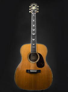 John Denver's 1982 Greven, "The White Lady": John Denver's 1982 acoustic 6-string Greven guitar, nicknamed "The White Lady." Sitka spruce top (from Ketchikan, Alaska), and highly flamed hard maple back, sides and neck (from Pennsylvania). No