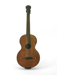 Early 19th c. Mirecourt Guitar: An early 19th century guitar that was made in Mirecourt, France. Mirecourt is known for its production of musical instruments, particularly violins. Made with flamed maple, this guitar had six