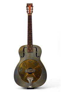 1933 National Duolian Resonator Guitar: Vintage 1933 National Duolian Resonator Guitar. Patent #1741453. Steel body with rolled-edge f-holes.This rare guitar features a nickel-plated tailpiece and ebonized maple fingerboard with no