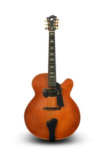 21st c. Lehmann hand-built oval hole 7-string archtop: A custom, hand-built 7-string archtop guitar with a unique oval sound hole. The guitar was built to match the specific needs of an acoustic 7-string archtop. The hand carved solid spruce top was