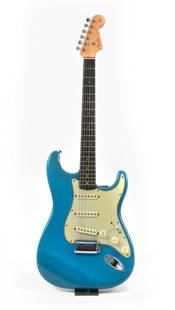 1963 Fender Stratocaster Lake Placid Blue: A very rare limited edition 1963 Fender Stratocaster in Lake Placid Blue. Serial #L10687. Solid alder body. The rarity of this guitar comes from its unique blue color. Bridgeplate, saddles, "fender