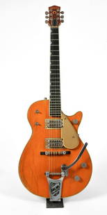 1959 Gretsch played by Peter Green of Fleetwood Mac: A original and rare 1959 Gretsch 6121 with factory fitted Bigsby. It retains its rare Filtertron pickups and includes the original Gretsch hard case. Peter Green is known as a 'guitar god' of 