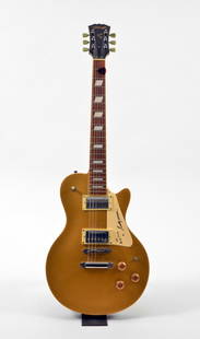 Guitar signed by Scotty Moore to BB King: Gold sparkle Stagg electric guitar signed by Scotty Moore to BB King. Scotty Moore was one one of the greatest guitarists of all time, and is best known for playing guitar for Elvis Presley. Many
