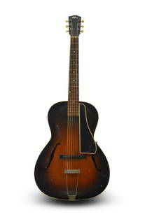 1932 Gibson L-50: A rare 1932 acoustic Gibson L-50 archtop guitar. The Gibson L-50 archtop model went through various changes throughout the 30's and 40's, such as changes in hardware and in body shape. An early