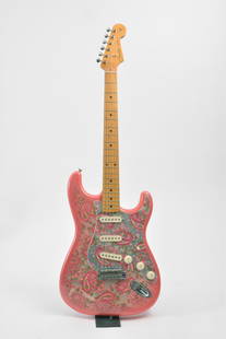 1990s Paisley Fender Stratocaster: A 1990s pink paisley Fender Stratocaster. Bright pink body, pink paisley design over all. The psychedelic design is a showstopper. Also impressive on this guitar are its sound, feel and performance.
