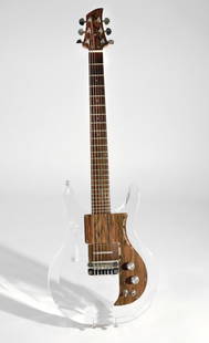 Plexiglass guitar used by Duran Duran: A 1969 Ampeg Dan Armstrong plexiglass guitar that was played in Duran Duran's music video "Girl Panic!," from the album All You Need is Now, released 2010 on Tape Modern Records. Played by supermodel