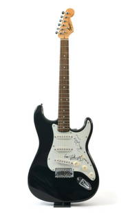 Keith Richards and Ronnie Wood signed guitar: A Squire electric guitar signed by Keith Richards and Ronnie Wood, guitarists in the Rolling Stones. One of the greatest bands in the world, and two legendary musicians. The consigner of this item