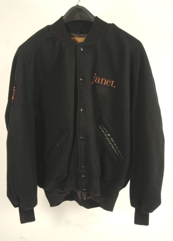 Janet Jackson 94 World Tour Jackets: Belonging to Tito and Taj, these two black wool jackets have "Janet" on the left front and back in rust color thread. Logos for Janet's World Tour are in black thread. Made by promowear, one is size 2