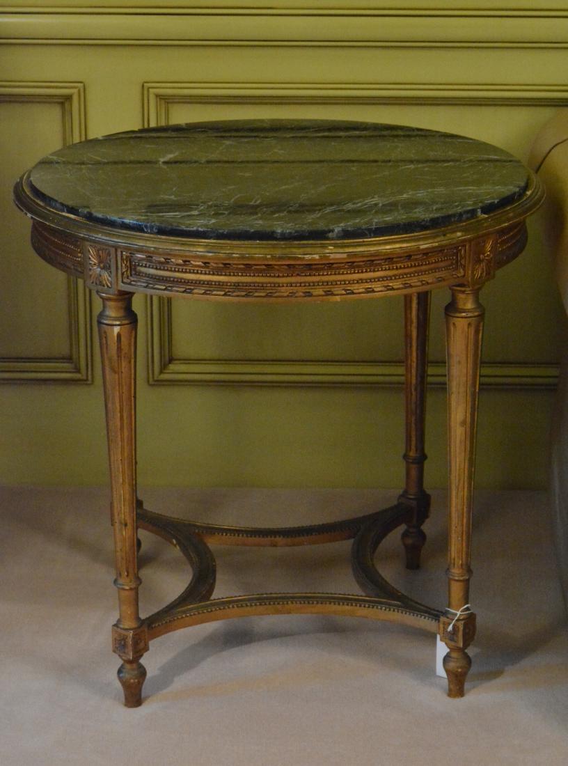 19th Century Louis XVI Style Gueridon: Giltwood with green marble top. Circa 1890. 31"D. x 30"H. Mansion Parlor 1. NO RESERVE. This lot was formerly the property of well-known real estate developer Mr. Melvin Simon and his wife, Bren Simon