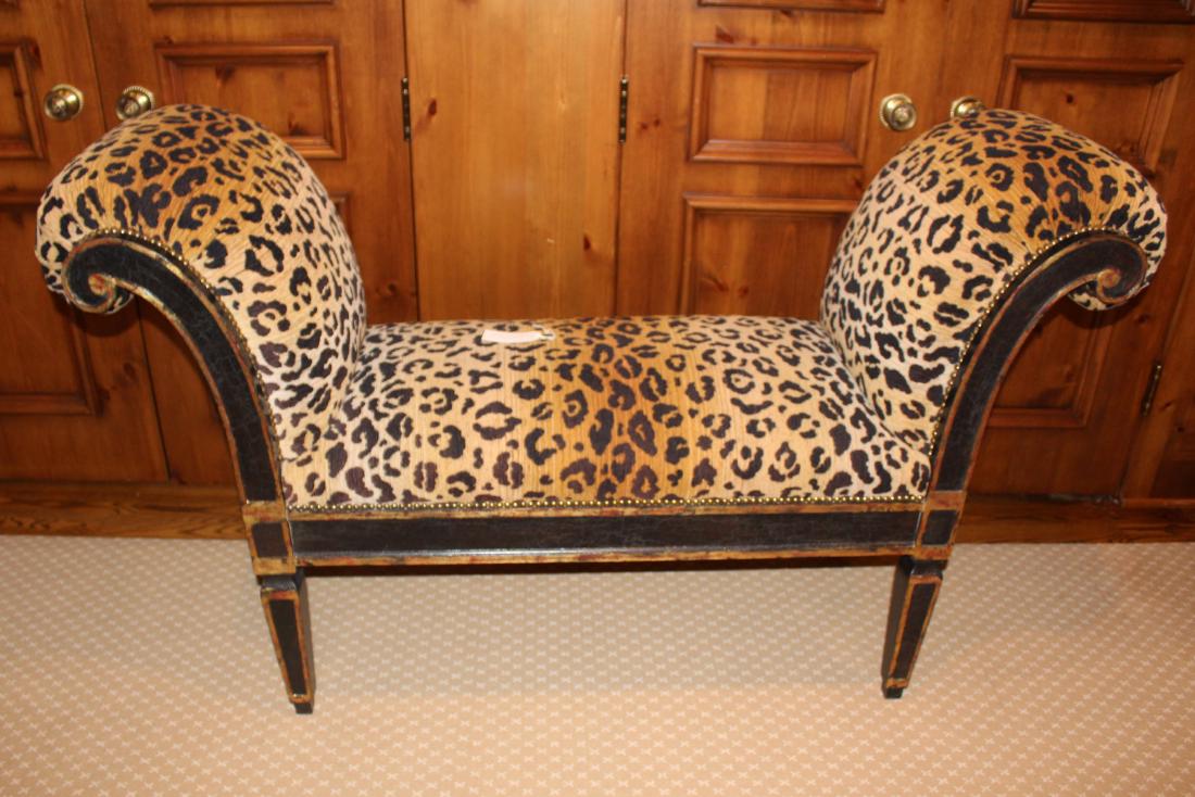 Decorator Settee: Cheetah upholstery. 39"H. x 55"W. x 20"D. Guest House Upstairs Hallway.NO RESERVE. This lot was formerly the property of well-known real estate developer Mr. Melvin Simon and his wife, Bren Simon. It 