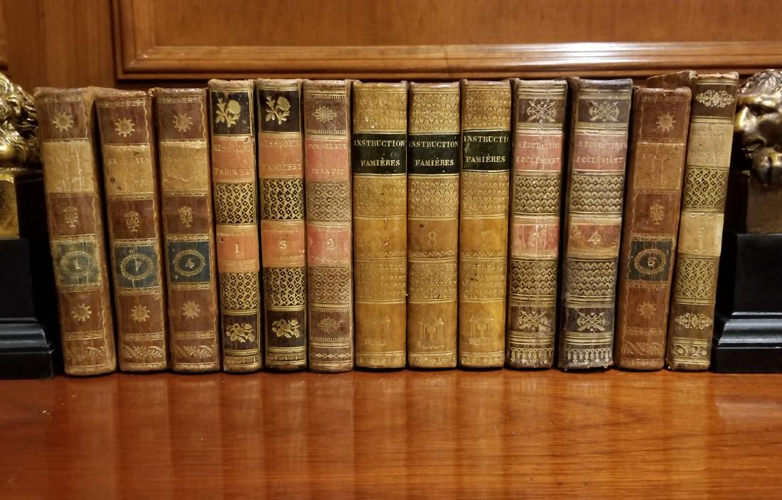 Decorative French Leather Bound Books (13): Decorative Leather Bindings. 13 early decorative leather bindings of various colors, mostly odd volumes in French from the early 19th century, full, 3/4, and 1/2 leather with marbled paper covered boa
