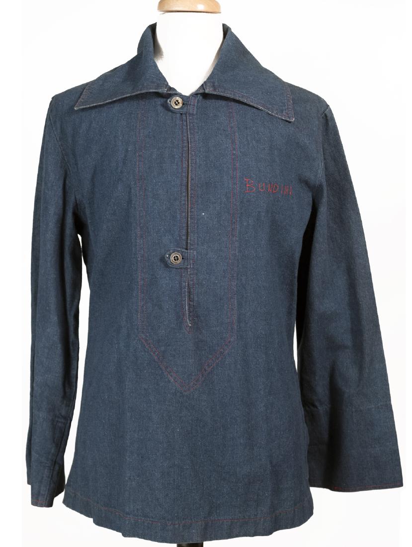 The Muhammad Ali / Bundini Brown Collection: Many described Drew "Bundini" Brown as Muhammad Ali's guru. Bundini was a friend, advisor and corner man to the Champ throughout Ali's long career. When Bundini died, he left a collection of t-shirts,