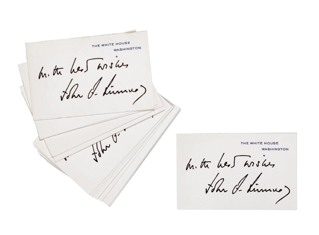 Best Wishes Card from JFK (20): Quantity 20. 2.5"x 4"cards on heavy stock embossed with "The White House Washington" In the President's handwriting, card reads "With Best Wishes John. F. Kennedy". On verso: "This is a facsimile repr