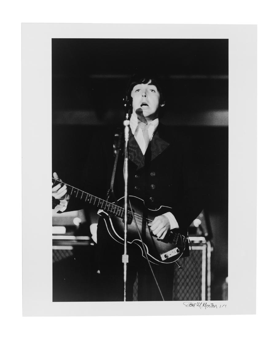 Paul McCartney Photograph: Signed D M. Morton 1/1. Black and white silver gelatin photograph of Beatles first arriving in the US. 1/1 designation indicates this is the only image of this size ever printed. 20" x 16" This is an 