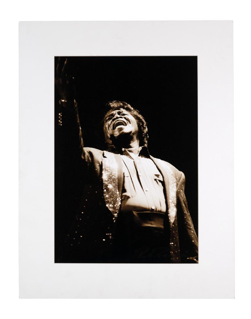 James Brown Photograph by Roberto Rabanne: James Brown. Photographic sepia-toned portrait of the legendary performer by noted rock photographer, Roberto Rabanne who boldly signed this print. 17.5"x 13" image size. This is an unreserved auction