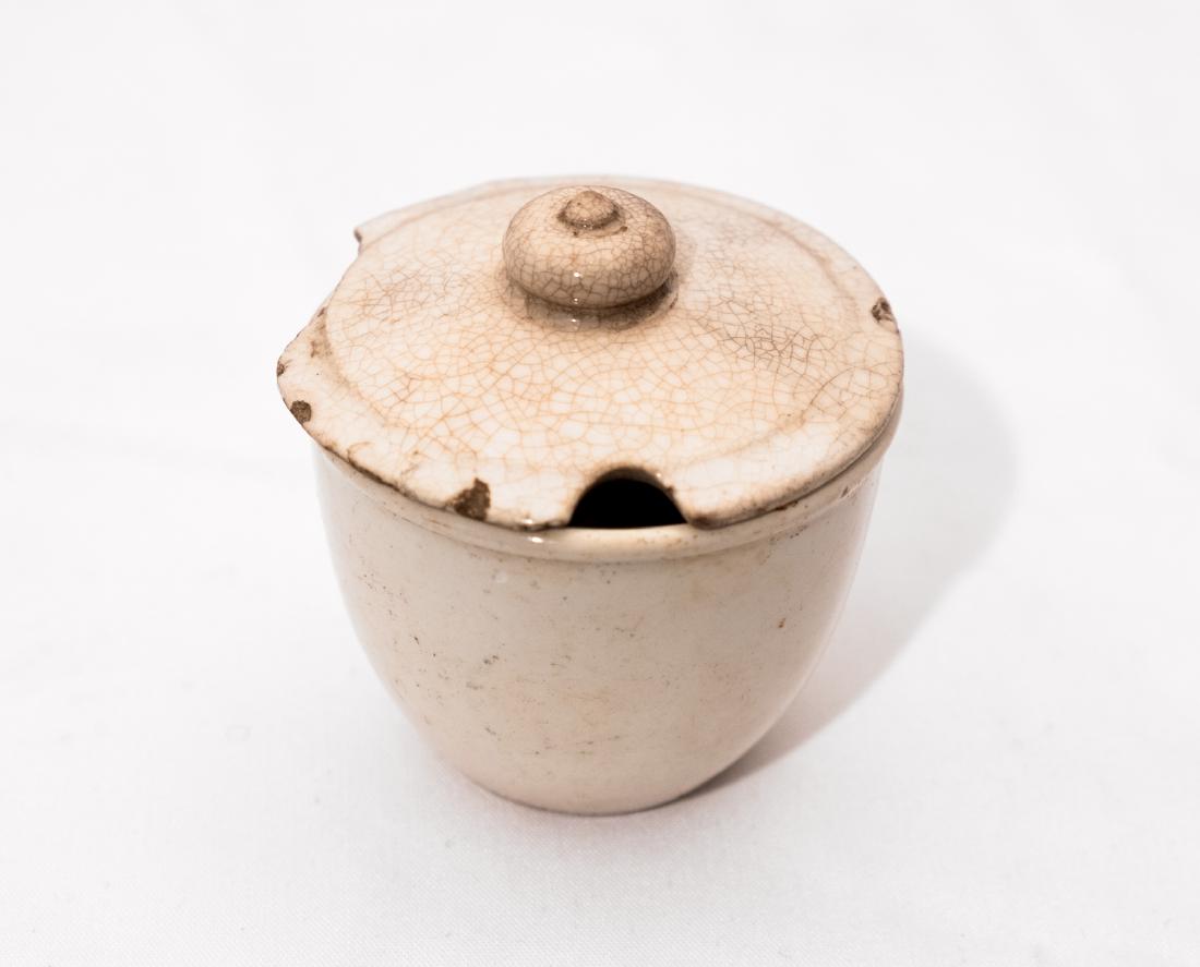 RMS Republic Cup with Lid. White Star Line.: White china. Cup 2"tall, Conservation Technology Group label attached to cup only. Built in 1903 by Harlan and Wolff in Belfast (the same builder which built the Titanic), White Star Lines' RMS Republ