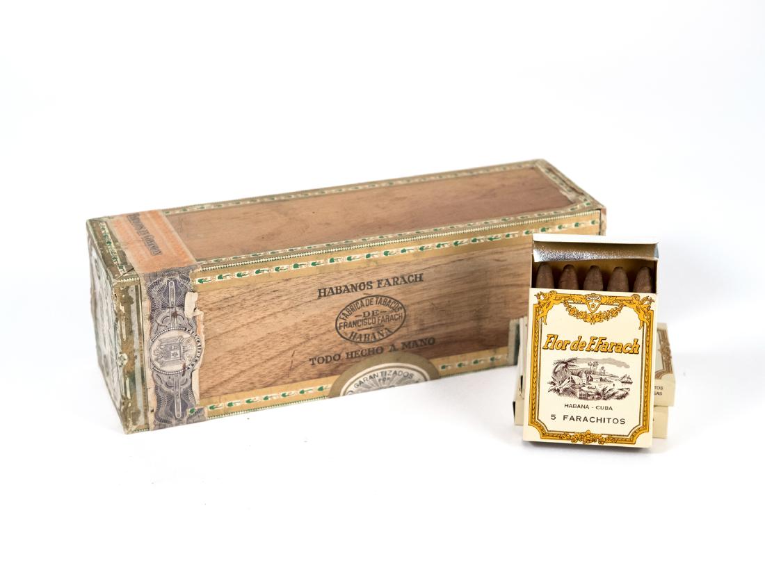 Pre-Castro Cuban Cigars.: Flor de F. Farach, sealed box of 100 Farachitos (small cigars), c. 1958. In December, 1983 an unprecedented auction was held of thousands of pre-Fidel Castro Cuban cigars. The sale was conducted at Ne